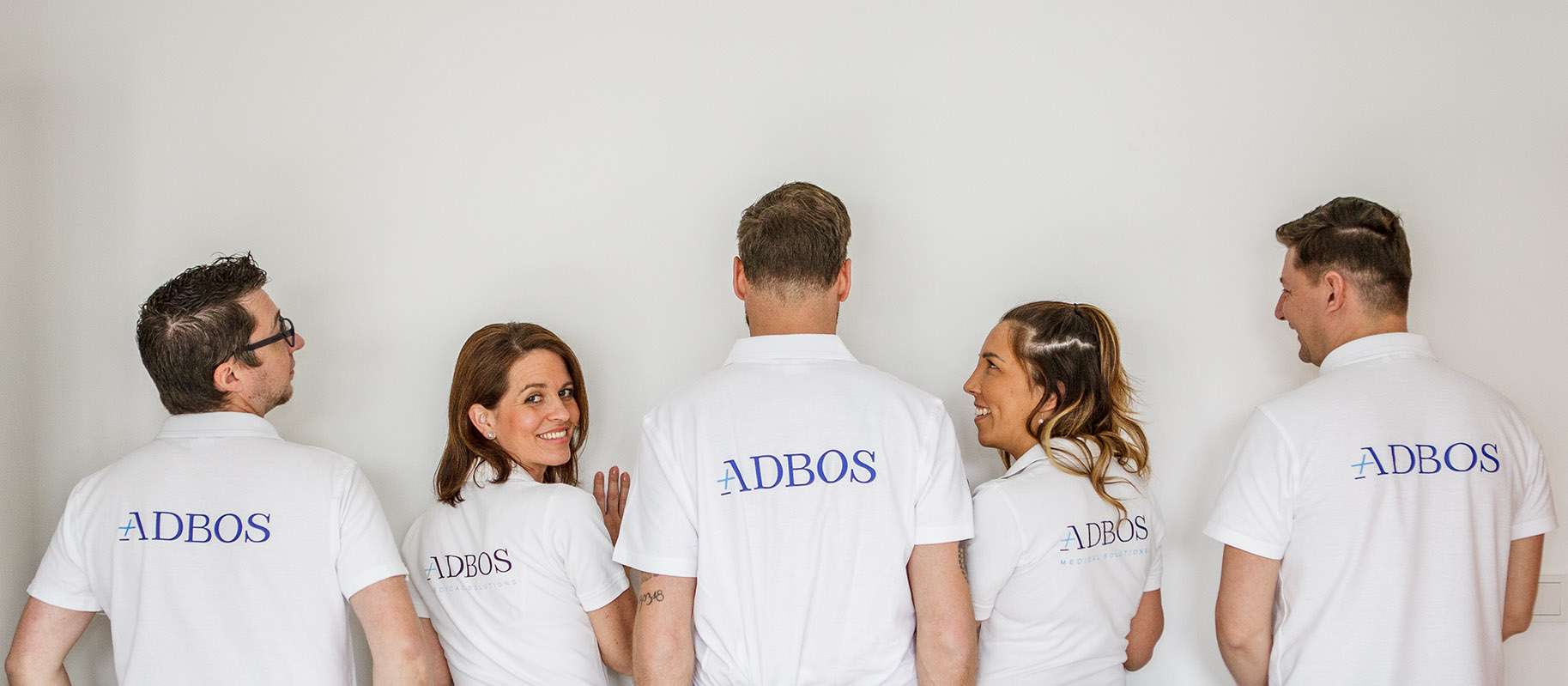 adbos team back 1600x700 7585b85f